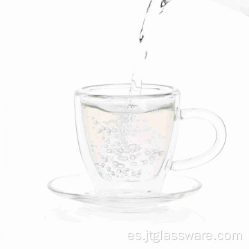 Taza de té de cristal popular con platillo